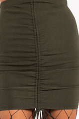 COMBATING FEELINGS STRETCH LACE UP MINI SKIRT OLIVE